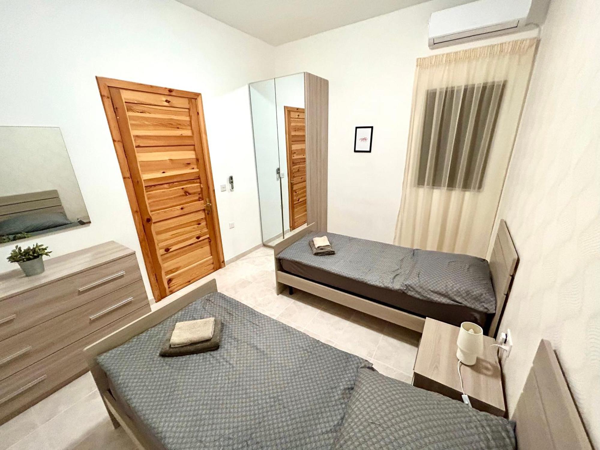 Arzella Apartments Xlendi Esterno foto