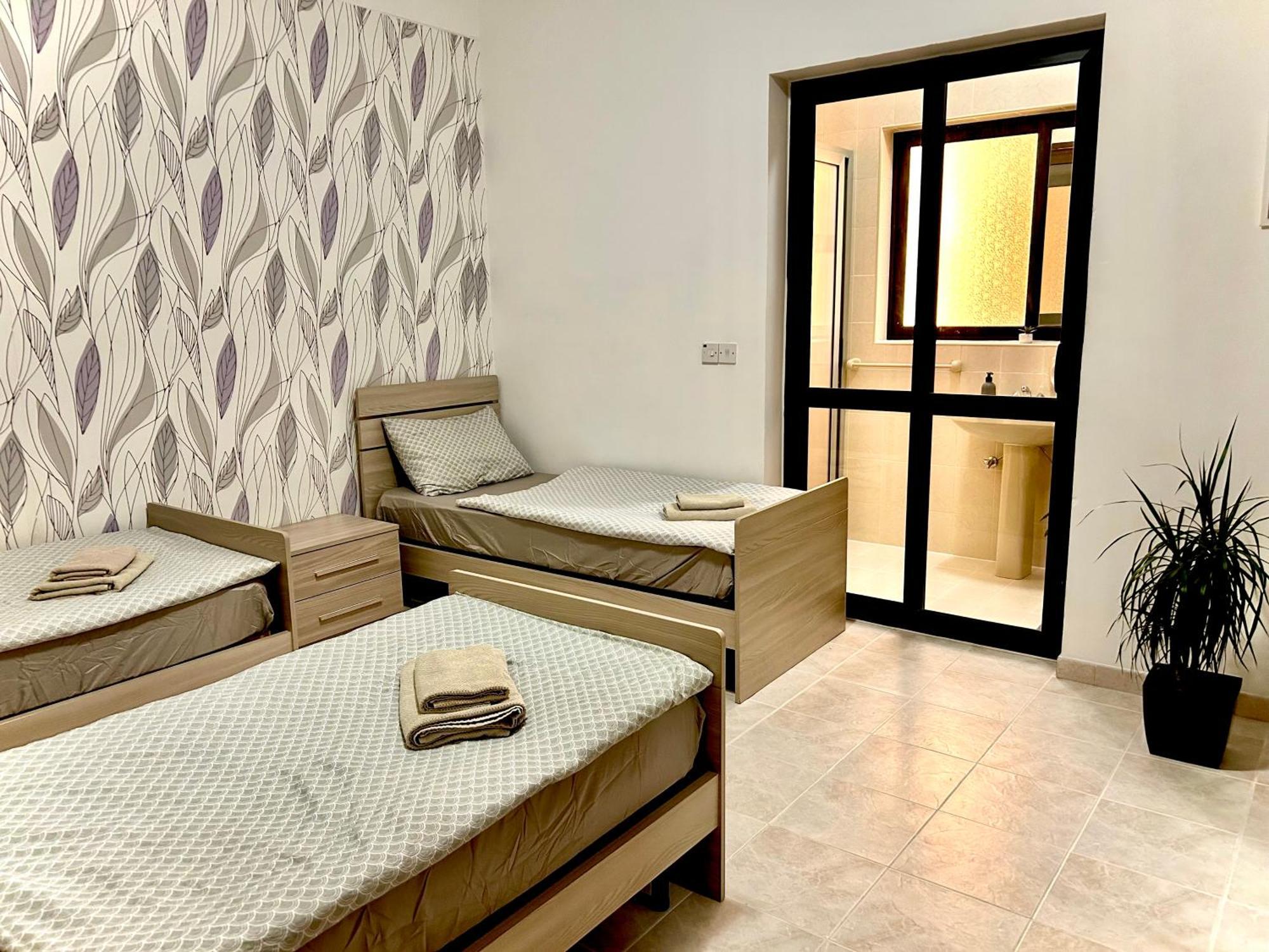 Arzella Apartments Xlendi Esterno foto